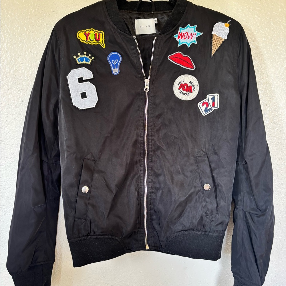 Lush Black Jacket with Colorful Patches